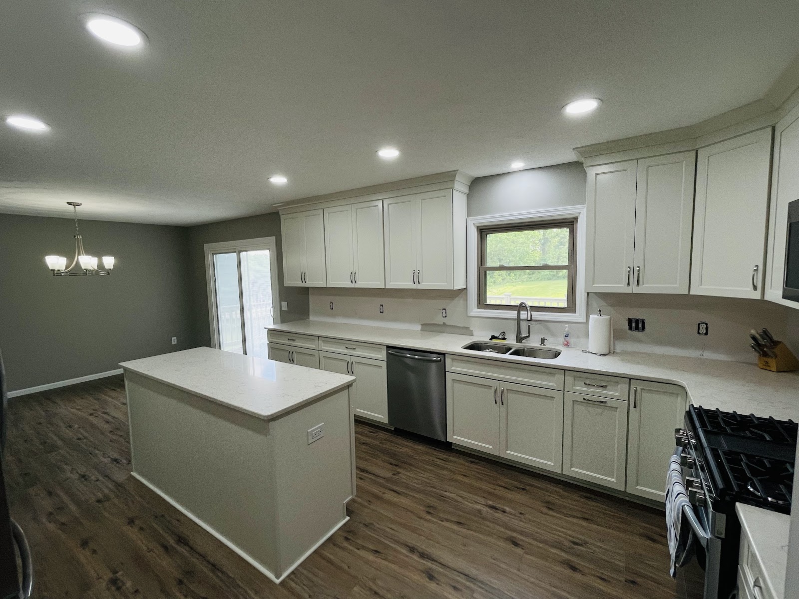 Kitchen remodel with custom cabinetry, stone countertops, and hardwood floors in Cuyahoga County
