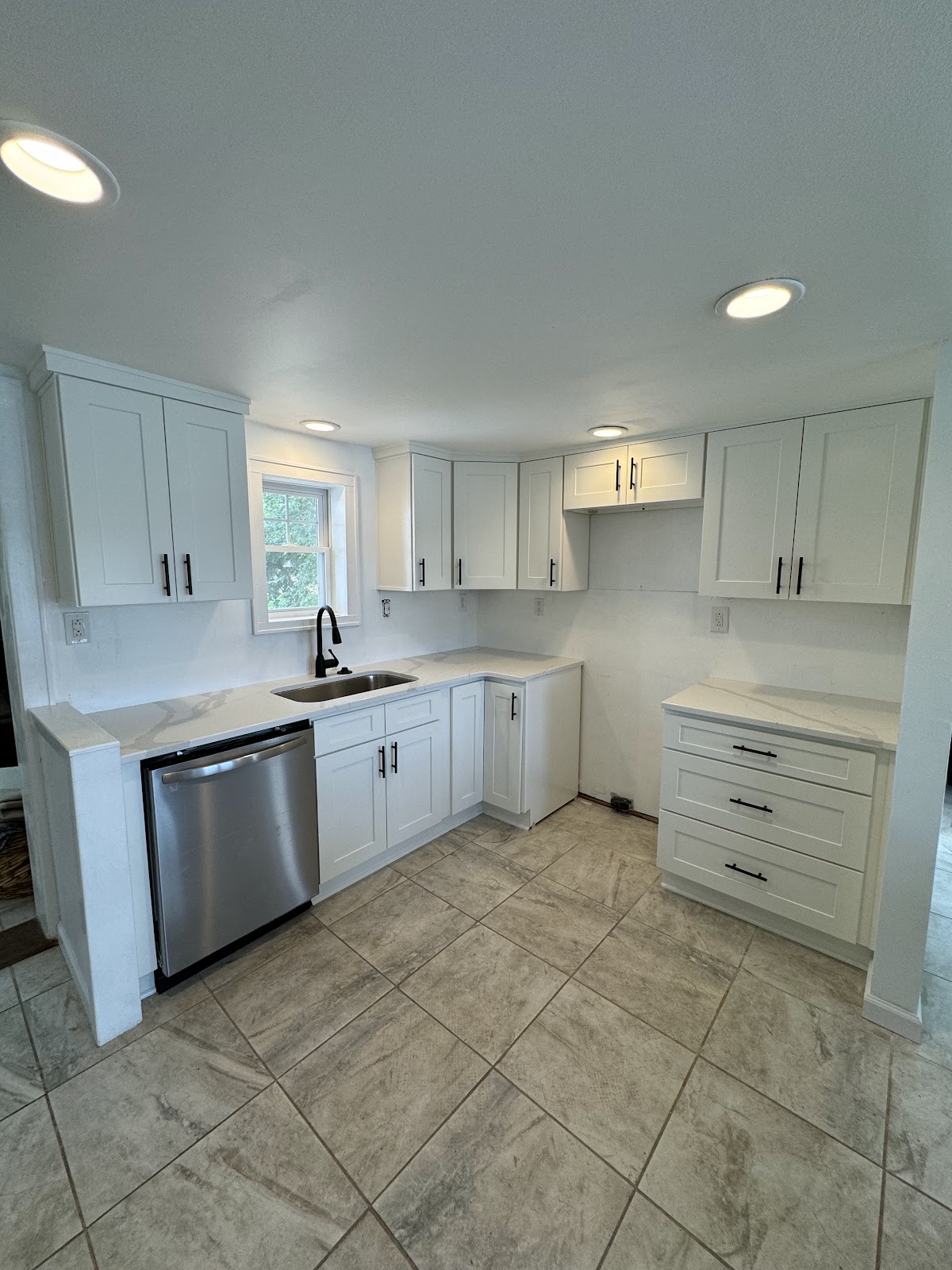 Bathroom renovation with walk-in shower, custom tile, and frameless glass in Lake County Ohio