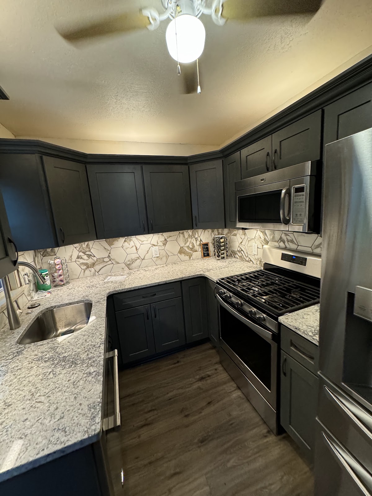 Bathroom remodel with custom tile, designer fixtures, and updated vanity in Lake County Ohio